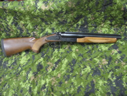 45-9mm-5-56mm:  gunrunnerhell: Norinco JW-2000 “Coach Gun” A modern day Chinese reproduction of a double-barreled 12 gauge shotgun. The one pictured has a shortened barrel, placing it in the SBS (Short Barreled Shotgun) classification. It has two