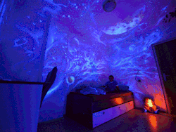 asylum-art:  Artist Bogi Fabian Creates Hidden Bedroom Murals Using Glowing UV Paints Vienna-based artist Bogi Fabian. Many of her creations look like completely normal bedrooms until you flip on a black light. Suddenly you’re floating in the middle