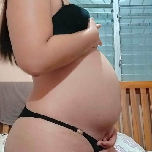 wannabepreggy:The new half empty belly is starting to look like a full one.🥰 Wanna see how big I can grow this? DM me to know how.😘