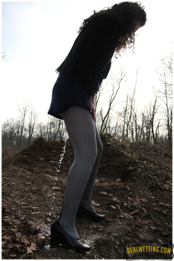 realwetting:  Sara was walking in the forest
