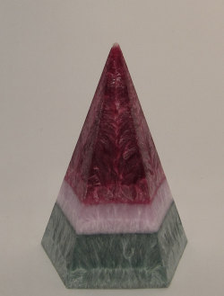 wickedclothes:  Vegan Wax Pyramid Candle Made entirely out of vegan-friendly wax, this candle holds a pyramid shape. The candle produces a black raspberry vanilla scent and burns down the middle, creating a unique glowing effect. Burns up to twenty-five