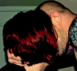 It is difficult to capture a real kiss without showing too much face, but I think that this one does it nicely.