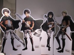 In-store cardboard stands of Levi, Eren, Mikasa, and Erwin with their utensils at Animate Ikebukuro, promoting the SnK x Animate Cafe event!More general SnK News &amp; Updates