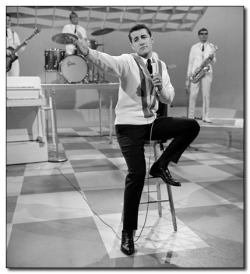 historical-nonfiction:  This is a young, hip Alex Trebek at age 23. He’s on a tv show called Music Hop in 1963 on the CBC in Canada. 