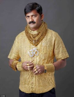  Indian man spent £14,000 on a solid gold shirt in the hope it will attract female attention.  I wonder if he has a camel with spinners