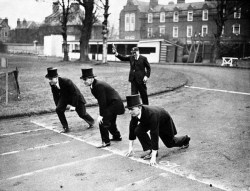 Policemen in Cambridge, known as Bulldogs, prepare to start the Bulldogs Chase during the Cambridge sports at the University ground, 1936.