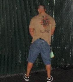 Peeing in public while holding a women&rsquo;s purse! You drunk John?   =P