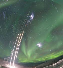 micdotcom:  NASA launched rockets into the Northern Lights — and the result is like a work of art  On Monday, NASA researchers were treated to an amazing light show right here on Earth. A team launched a series of rockets high into the Alaskan sky right
