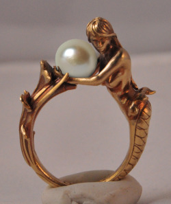 omniastudios:  &ldquo;Arianna&rdquo; art deco inspired mermaid ring. Available in brass and sterling silver. Arianna holds an 8mm black or white pearl. Now available for purchase. www.omniaoddities.com 