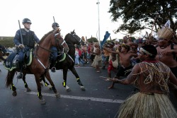 arte-mysia:  racism-sexist-ableism-ohmy:  duckyshepherd:  carnivaloftherandom:  rishu-jpn:  Brazilian police clash with indigenous groups protesting World Cup.  This is important.  The only kind of thing I’ll be posting about the World Cup  We will