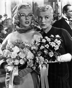 suicideblonde:  Marilyn Monroe and Betty Grable in How to Marry a Millionaire (1953) 