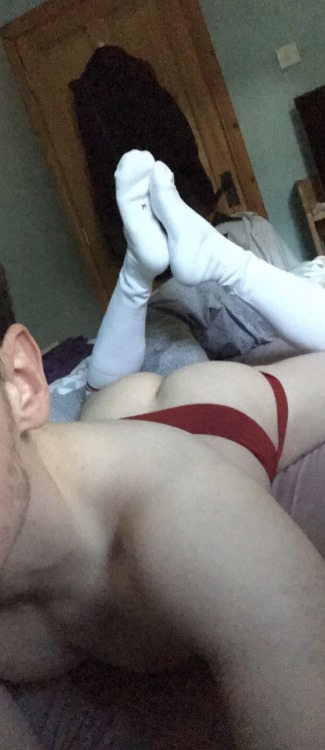 eirefagboy:  Trying out a new slutty look! Red jockstap and white football socks 