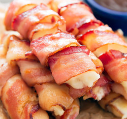 nom-food:  Bacon wrapped cheese sticks