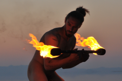 maleinstructor:  Fire Dancing Dan Hancock photographed by Tom Clark on The Great Salt Lake in Utah 