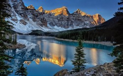 Moraine Lake Moraine Lake is a glacially-fed lake in Banff National Park, 14 kilometres (8.7 mi) outside the Village of Lake Louise, Alberta, Canada. It is situated in the Valley of the Ten Peaks, at an elevation of approximately 6,183 feet (1,885 m).