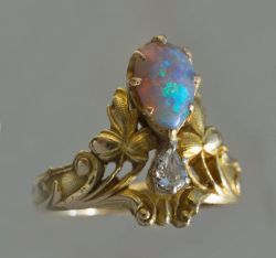 sartorialadventure: Art nouveau diadem ring, made of gold, opal, and diamonds. French, c. 1900