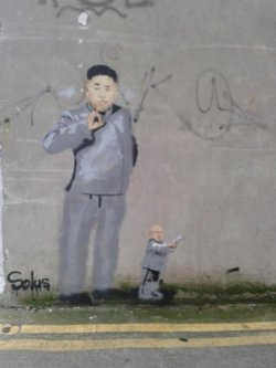 collegehumor:  Dr. Evil Kim Jong-Un Mashup Graffiti He finally found his weapon of mass destruction. 