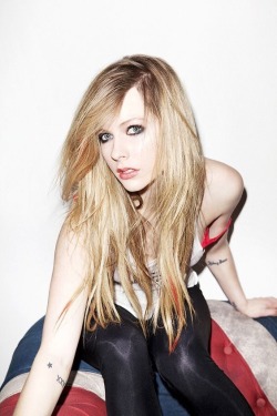 jaydeeblake:Avril Lavigne  Another girl that I used to jerk off to a lot. How can you not, right? I mean she‘s beautiful, she has that sexy look and she‘s always wearing all these stockings and socks that make me hard in no time. Get your cocks out