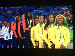 king-emare:  thehighpriestofreverseracism:  Look at the teams getting medalled for women’s relay 4X100m.  Gold: USA Silver: JAMAICA Bronze: UK  every single athlete on the podium is a black woman✊🏿✊🏾✊🏽  #BlackWomendidthat   Love