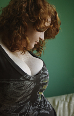 msunsolvedmystery:  Dunno who she is though I’ve seen some of these pics before. Love her curly red hair and big pierced boobs
