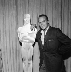 Vintageblackglamour:  Harry Belafonte Leans Against An Oscar Statue At The Academy
