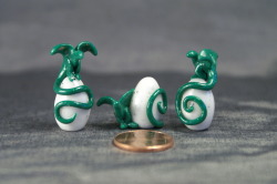 scaylen:  Green baby dragons! These little guys are handmade out of polymer clay. Available at my Etsy shop: www.etsy.com/shop/DragonJewelryArt 
