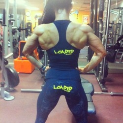 femalemuscletalk:  The shirts okay but maybe I shouldn’t have put the word “loaded” on  the back of my pants.  800.222.3539 (FLEX) #bodybuilding #female bodybuilders #fitness competitors