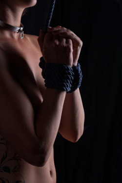 scentofslave:S Ah, nothing says captive quite like being led around by tied hands, well, except maybe being led by a chain through the collar ring.
