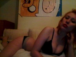 Amelialilly rocks her adventure time poster, and bright red lipstick