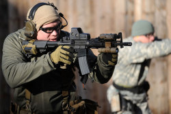 house-of-gnar:  A Special Forces soldier with the 1st Battalion / 10th Special Forces Group (Airborne) (1/10th SFG(A)) pictured at a firing range, training with a close quarters battle receiver (CQBR) carbine.This Green Beret’s CQBR is fitted with