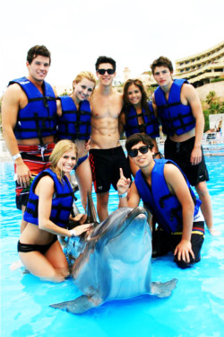 David Henrie and blue life jackets one of them is Greg Sulkin