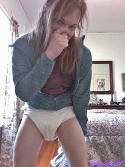 bosskat:  Waking up this morning- no makeup, no bra, messy hair, and a wet diaper :-p  Wet diaper and hoodie!