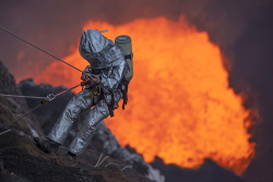 yahoonewsphotos:  Christmas day expedition to Marum Volcano in Vanuatu  Descending into the Marum Volcano in Vanuatu, Intrepid explorers found an unusual way of staying warm this winter by spending Christmas day on an active volcano. British climber Chris
