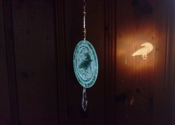 ornamentalglass: Celtic Raven with Triskelion, crystallized dichroic glass RainbowLightcaster. This could also be one of Odin’s eyes. The crystallized dichroic glass will change to six different colors depending on the angle and whether it is back lit
