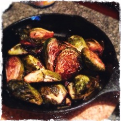theafternoonmoon:  This meal felt like a celebratory meal even though there was nothing specific to celebrate: balsamic roasted Brussels sprouts with garlic, endives braised with chicken broth and thyme, and Frenched lamb rib chops that were simply pan