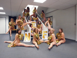 nakedenfcaptions:After the cheerleaders lost the bet, they had to pose for the yearbook naked.