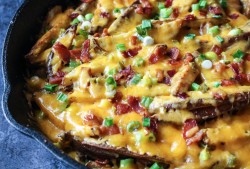 foodfuckery:  Skillet Oven Fries with Cheddar, Bacon, Pickled Jalapeños, &amp; Ranch Recipe 