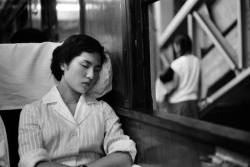 collaro:  Young Girl in a Train, Japan, 1958 by Marc Riboud  