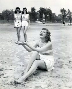 vintageeveryday: Cute forced perspective snap from the 1940s. 