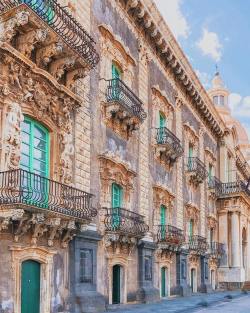 i-traveltheworld:Triumph of baroque balconies in Catania, Sicily, Italy😍🤗🌍❤️