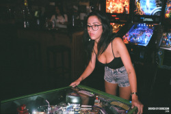 drivenbyboredom:  Important photos of April playing pinball. - Driven By Boredom - Shop DBB - Girls Of DBB - Instagram - Twitter -   So serious and so cheesin
