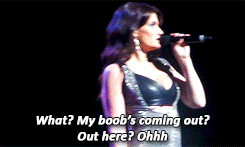  Idina Menzel suffering a little underboob wardrobe malfunction at her Radio City Music Hall concert on June 16th (+ more) 