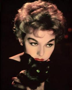  Kim Novak in a promotional photo for Bell, Book and Candle  (Richard Quine, 1958), holding Pyewacket  