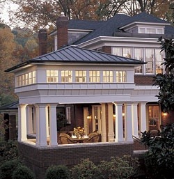 sweetestesthome:  Capping a porch with a clerestory and roof becomes a fabulous space at night! 