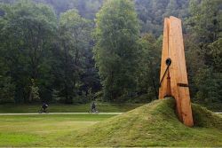 sixpenceee:  A giant clothespin sculpture appears to pinch a mound of grass &amp; dirt in Liege, Belgium. Designed by Turkish artist &amp; professor, Mehmet Ali Uysal. (Source) 
