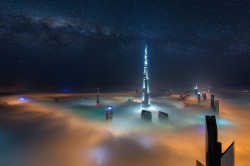 nubbsgalore:  photos from dubai’s 828 meter tall burj khalifa (save the first and last photos, which show the building) by (click pic) daniel cheong, karim nafatni, bjoern lauen and dave alexander. duabai only experiences this in september and march,