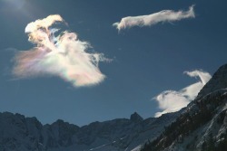 speaks:  Iridesence in clouds over Gran Paradiso National Park, Italy by Piero Armando