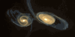amnhnyc:  Astronomers have long pondered the origins of enormous elliptical galaxies in the young Universe. An object 11 billion light-years away spotted by the Herschel mission may help unravel the mystery.  Two massive spiral galaxies merged to create