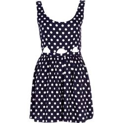 i-love-polka-dots:  Navy polka dot cut out romperSearch for more Jumpsuits &amp; Rompers by River Island on Wantering.