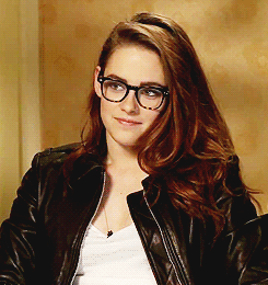 Kristen Stewart folds her arms“On the road” interview with V101&rsquo;s Big Al